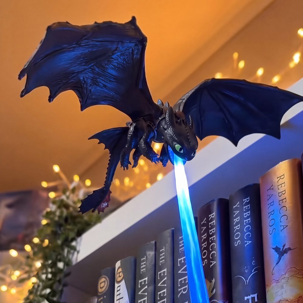 Shelf Dragon lit on a shelf